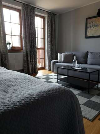 Отели типа «постель и завтрак» Majątek Morgi Suchowola Улучшенный трехместный номер-9